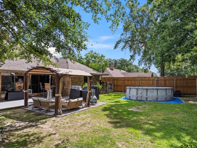 1801 N Fairway, Mount Pleasant, TX 75455 - fenced backyard featuring a gazebo and an outdoor hangout area