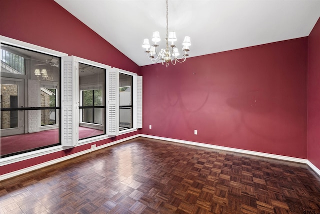 spare room featuring lofted ceiling, healthy amount of natural light, a chandelier, and baseboards
