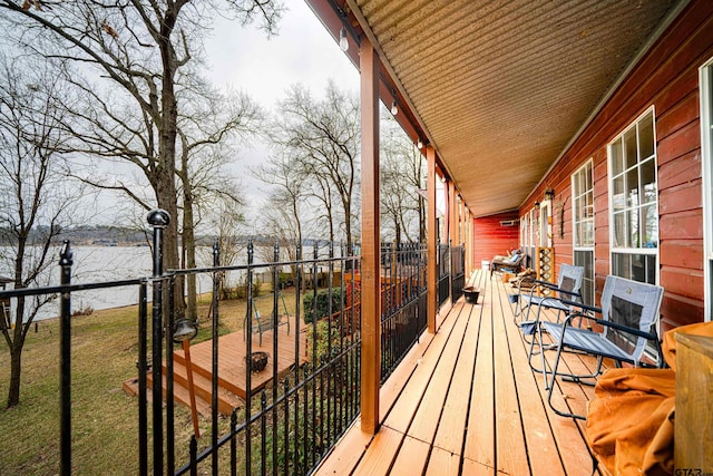 deck featuring a water view