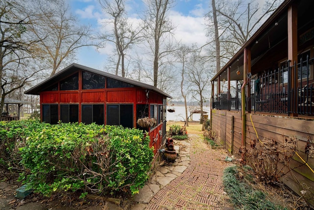 view of side of property with a water view