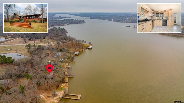 bird's eye view with a water view