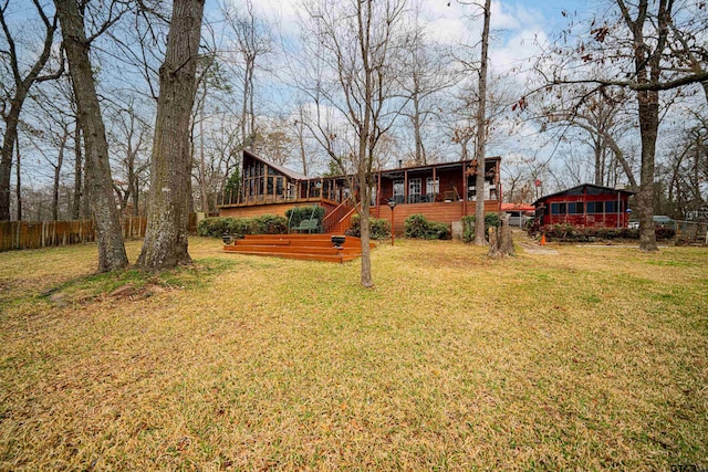 view of yard featuring a wooden deck