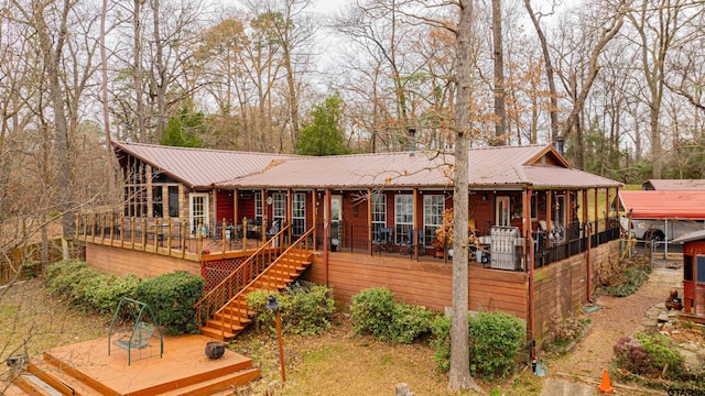 view of front of property featuring a wooden deck