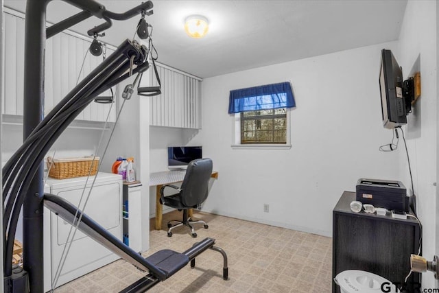 office featuring washer / dryer and baseboards