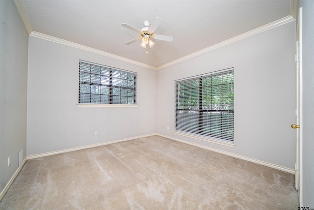 9211 Elm Tree Cir, Tyler, TX 75703 - empty room featuring carpet, crown molding, plenty of natural light, a ceiling fan, and baseboards