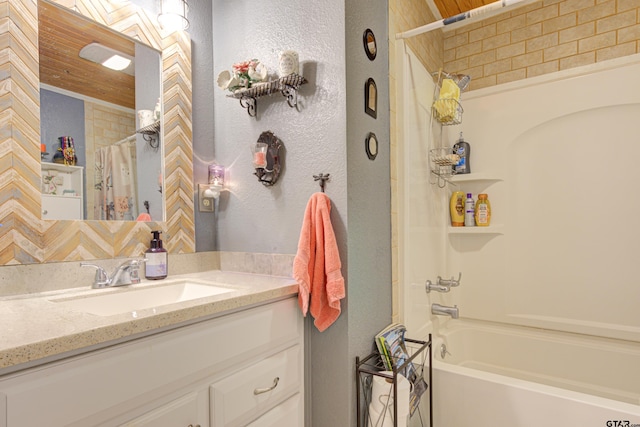 bathroom featuring vanity and shower / bath combo