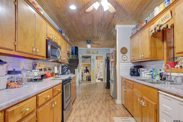 kitchen with sink, light hardwood / wood-style flooring, decorative backsplash, wood ceiling, and stainless steel appliances