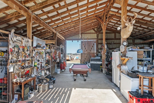 garage with a workshop area