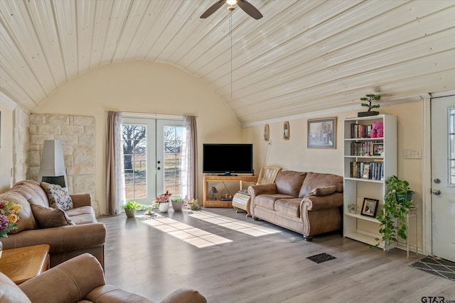 living area featuring wood finished floors, french doors, wooden ceiling, lofted ceiling, and ceiling fan