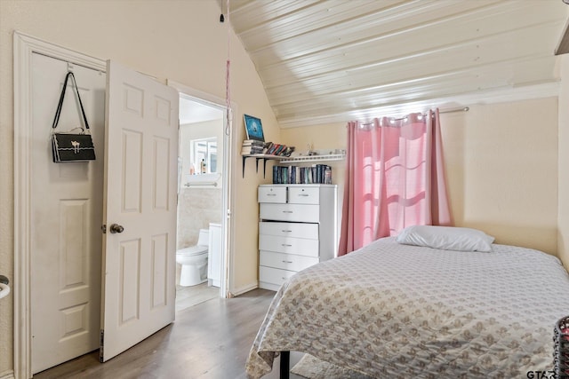 bedroom with ensuite bath, lofted ceiling, wood finished floors, and wooden ceiling