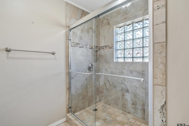 bathroom featuring a shower stall