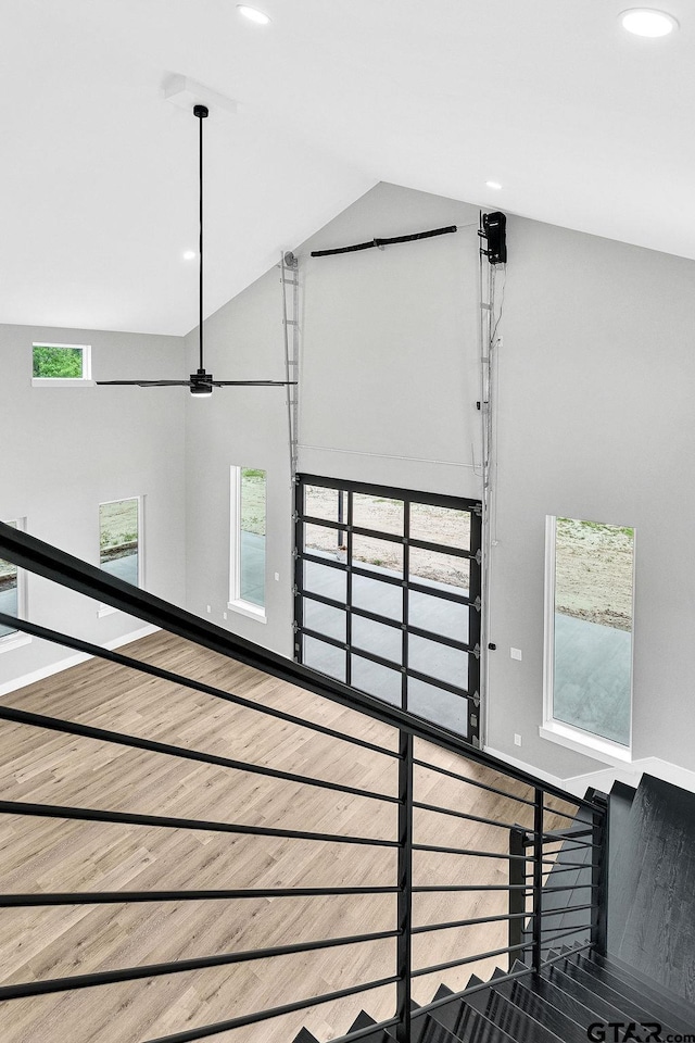 3255 Vz County Road 2120, Canton, TX 75103 - stairway featuring baseboards, recessed lighting, high vaulted ceiling, and wood finished floors