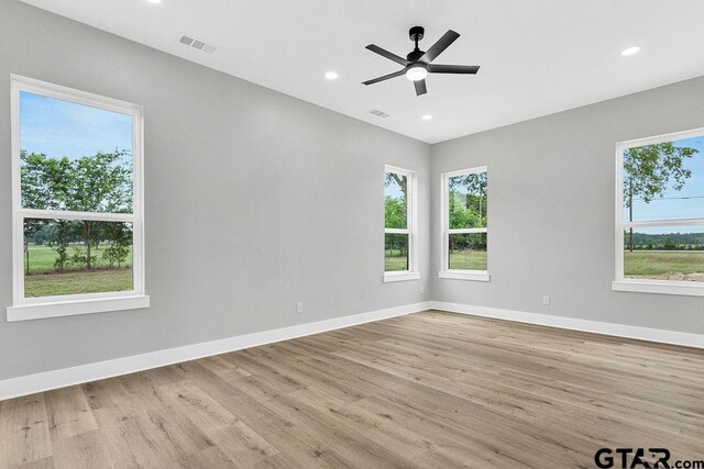 3255 Vz County Road 2120, Canton, TX 75103 - spare room with wood finished floors, baseboards, ceiling fan, and recessed lighting