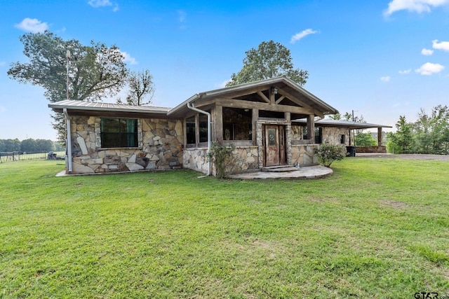 2711 N Fm 250, Hughes Springs, TX 75656 - view of front facade with stone siding and a front lawn