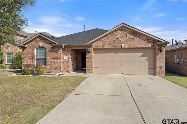 ranch-style home featuring a garage and a front lawn