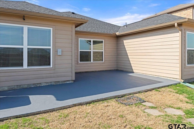 view of home's exterior with a patio area