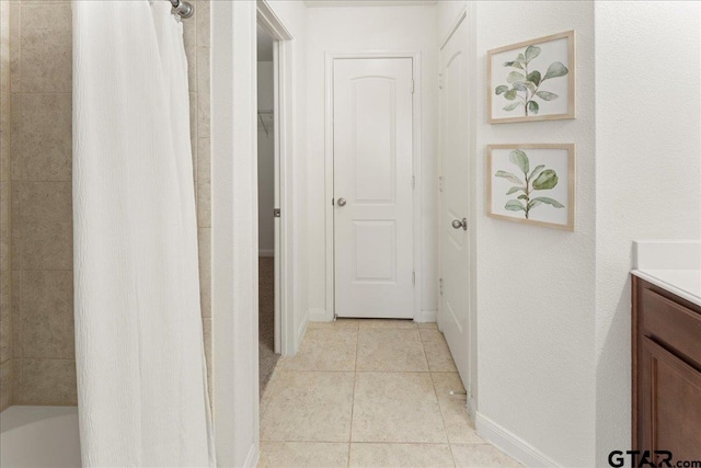 bathroom with vanity and tile patterned floors