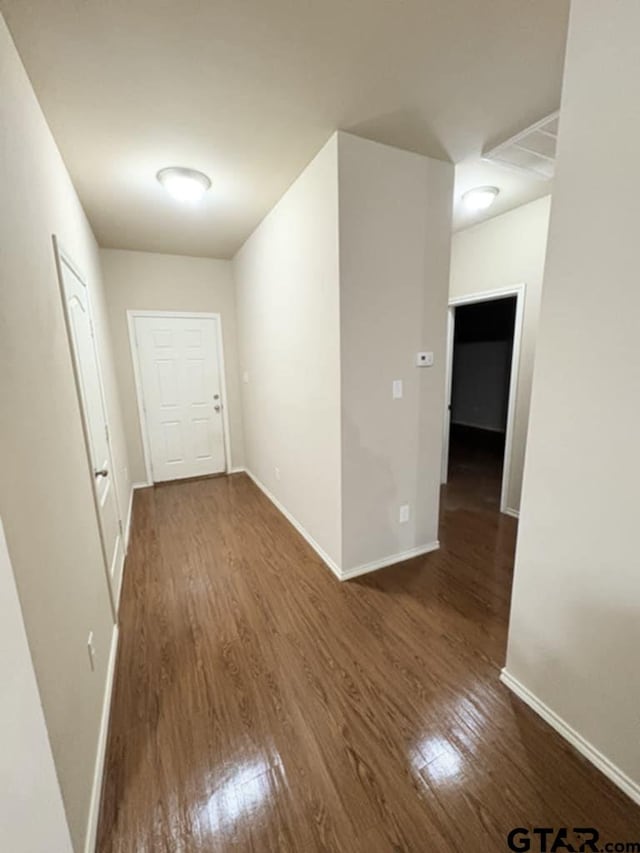 19481 Big Valley Dr, Flint, TX 75762 - corridor with wood finished floors and baseboards