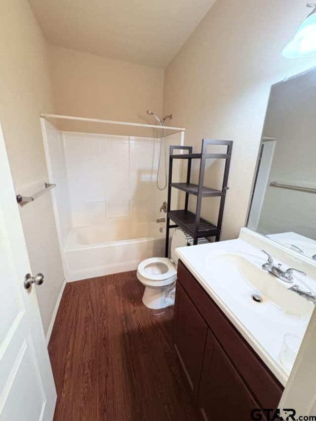 19481 Big Valley Dr, Flint, TX 75762 - full bathroom with wood finished floors, vanity, and washtub / shower combination