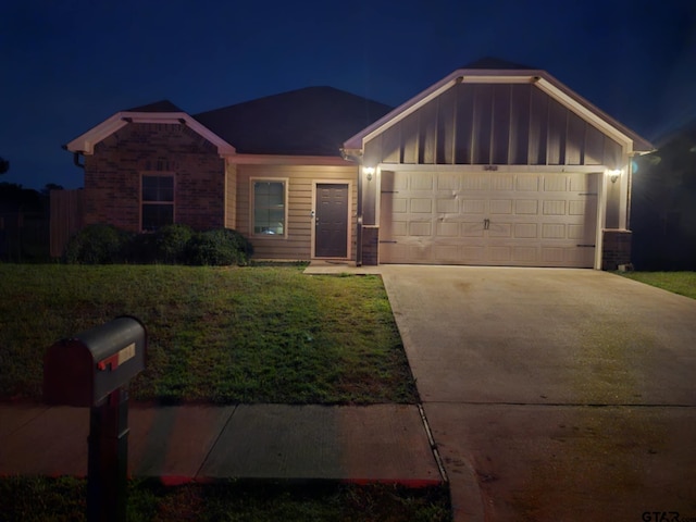 19481 Big Valley Dr, Flint, TX 75762 - ranch-style house with board and batten siding, driveway, an attached garage, and a lawn