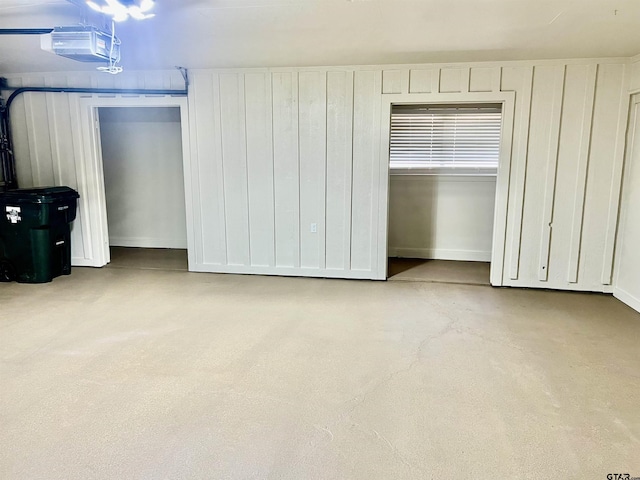 interior space with a garage door opener