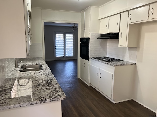 kitchen featuring black appliances, dark hardwood / wood-style floors, sink, and white cabinetry