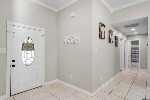 tiled entryway with ornamental molding