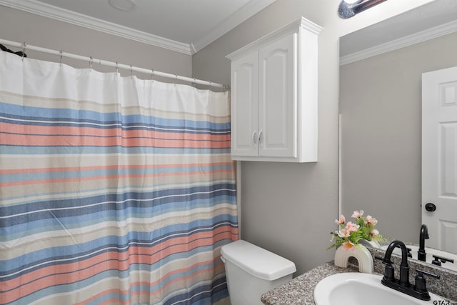 bathroom with a shower with shower curtain, vanity, toilet, and ornamental molding