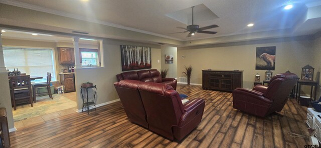 406 Brookwood Dr, Mount Pleasant, TX 75455 - home theater with wood finished floors, ornamental molding, ceiling fan, a raised ceiling, and recessed lighting