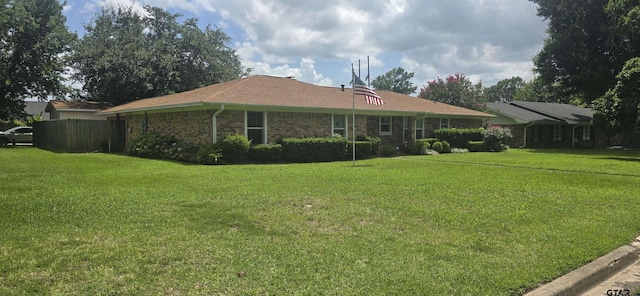 406 Brookwood Dr, Mount Pleasant, TX 75455 - back of property featuring brick siding