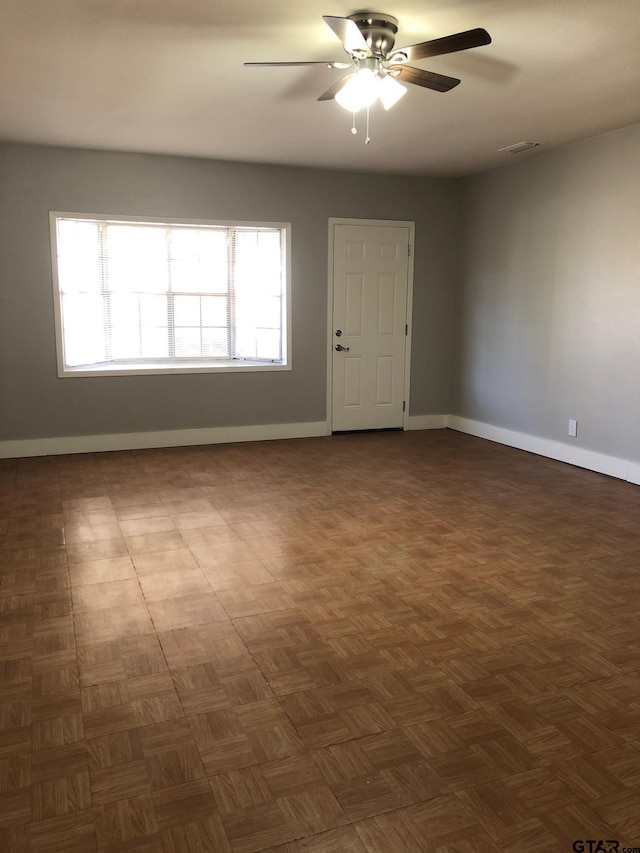 1516 Bowie Dr, Tyler, TX 75701 - unfurnished room with a ceiling fan and baseboards