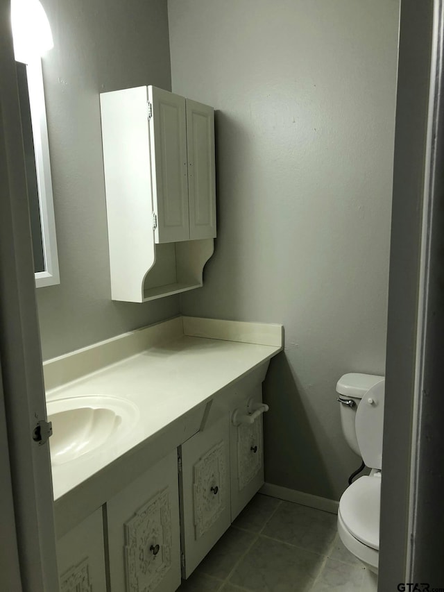 1516 Bowie Dr, Tyler, TX 75701 - half bath with vanity and tile patterned flooring