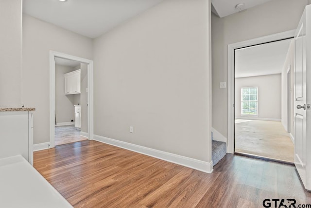 empty room featuring hardwood / wood-style flooring