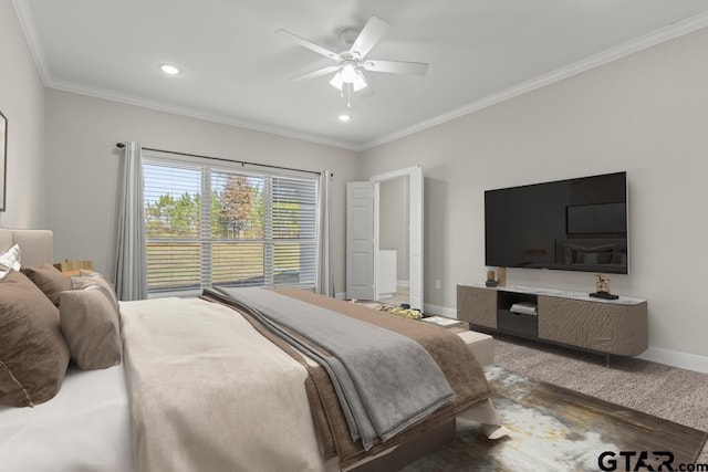 bedroom with carpet flooring, ceiling fan, and crown molding