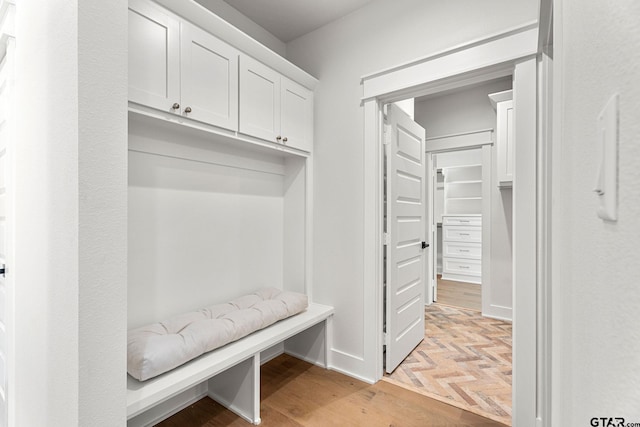 mudroom featuring light parquet flooring