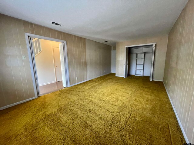 unfurnished bedroom featuring carpet