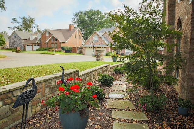 view of yard with a residential view