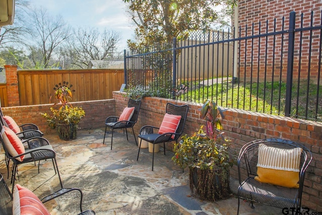 view of patio featuring a fenced backyard