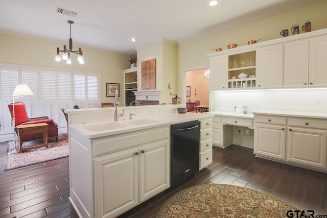 kitchen featuring black dishwasher, visible vents, wood finish floors, open shelves, and built in desk