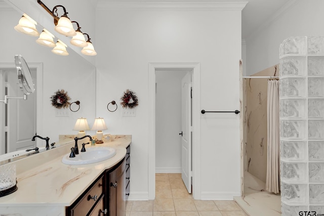 bathroom with a shower with curtain, vanity, tile patterned floors, and ornamental molding