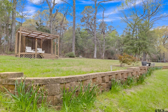 view of yard with a pergola and a wooden deck