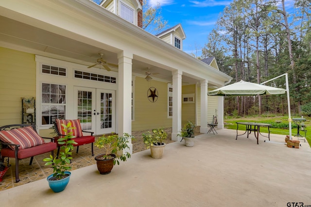 view of patio with french doors and ceiling fan