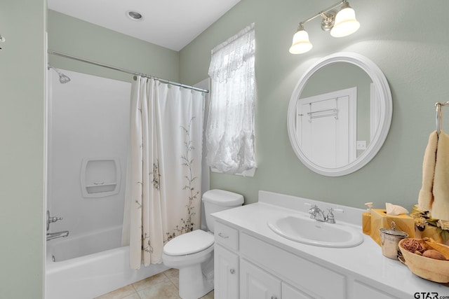 full bathroom with toilet, vanity, tile patterned floors, and shower / tub combo