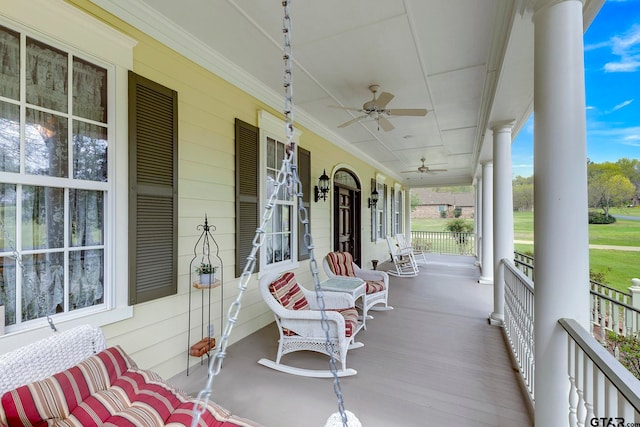 view of patio featuring covered porch and ceiling fan