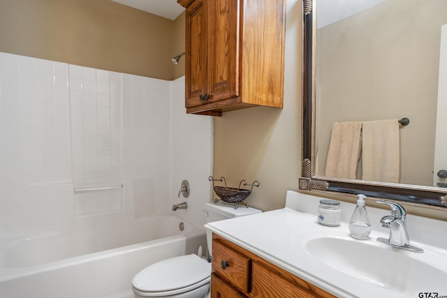 bathroom with shower / bathtub combination, toilet, and vanity