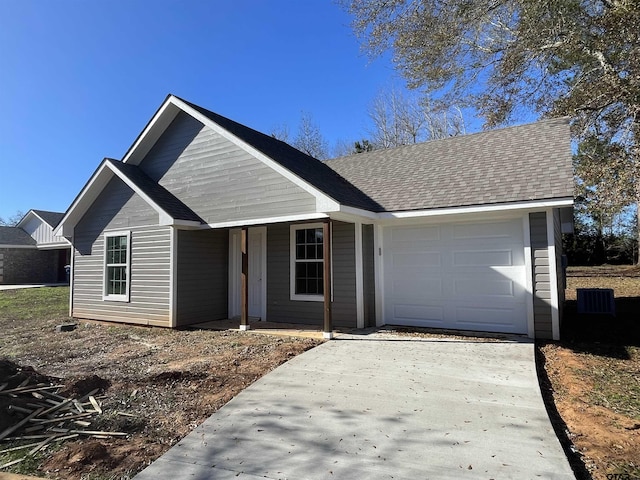 ranch-style house featuring a garage