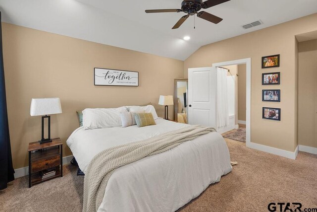 17127 Meadowview Ln, Lindale, TX 75771 - bedroom featuring light colored carpet, vaulted ceiling, and a ceiling fan