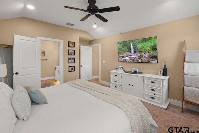 17127 Meadowview Ln, Lindale, TX 75771 - bedroom with vaulted ceiling, ceiling fan, and ensuite bathroom