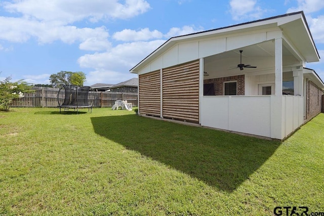 17127 Meadowview Ln, Lindale, TX 75771 - view of yard featuring a ceiling fan and a trampoline