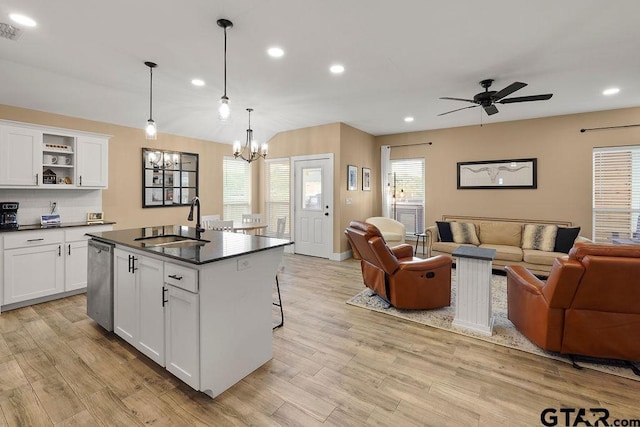 17127 Meadowview Ln, Lindale, TX 75771 - kitchen featuring open floor plan, dark countertops, recessed lighting, dishwasher, and a chandelier